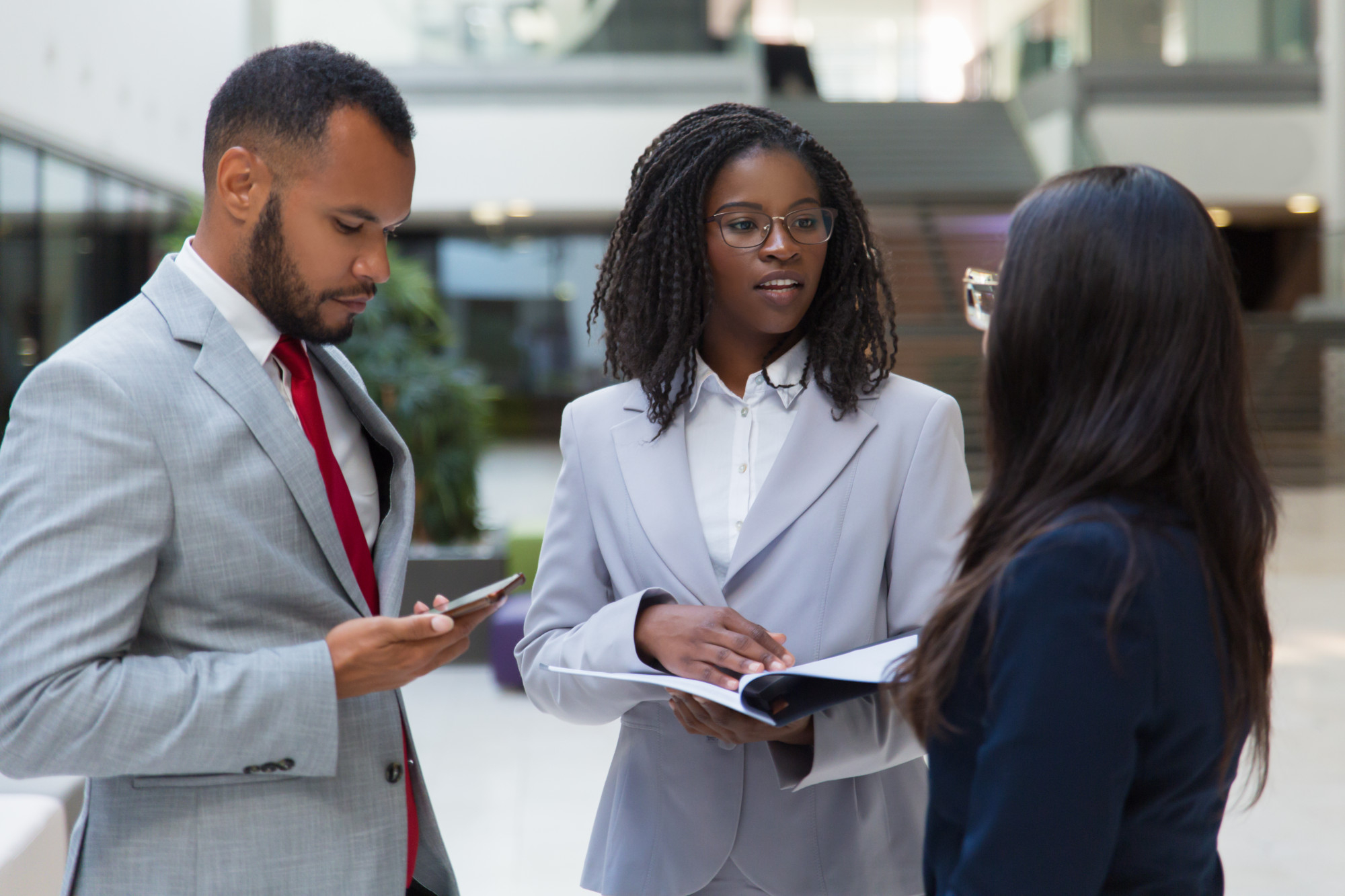 Illustrative photograph of professionals in discussion
